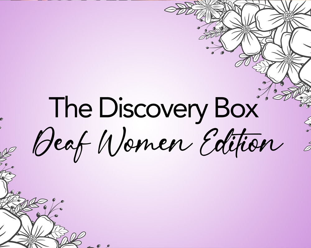 Discovery Box Deaf Women Edition logo - Black letters on purple field with flowers in the corners.