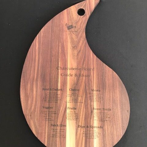 Teardrop shaped charcuterie board, with engraving.