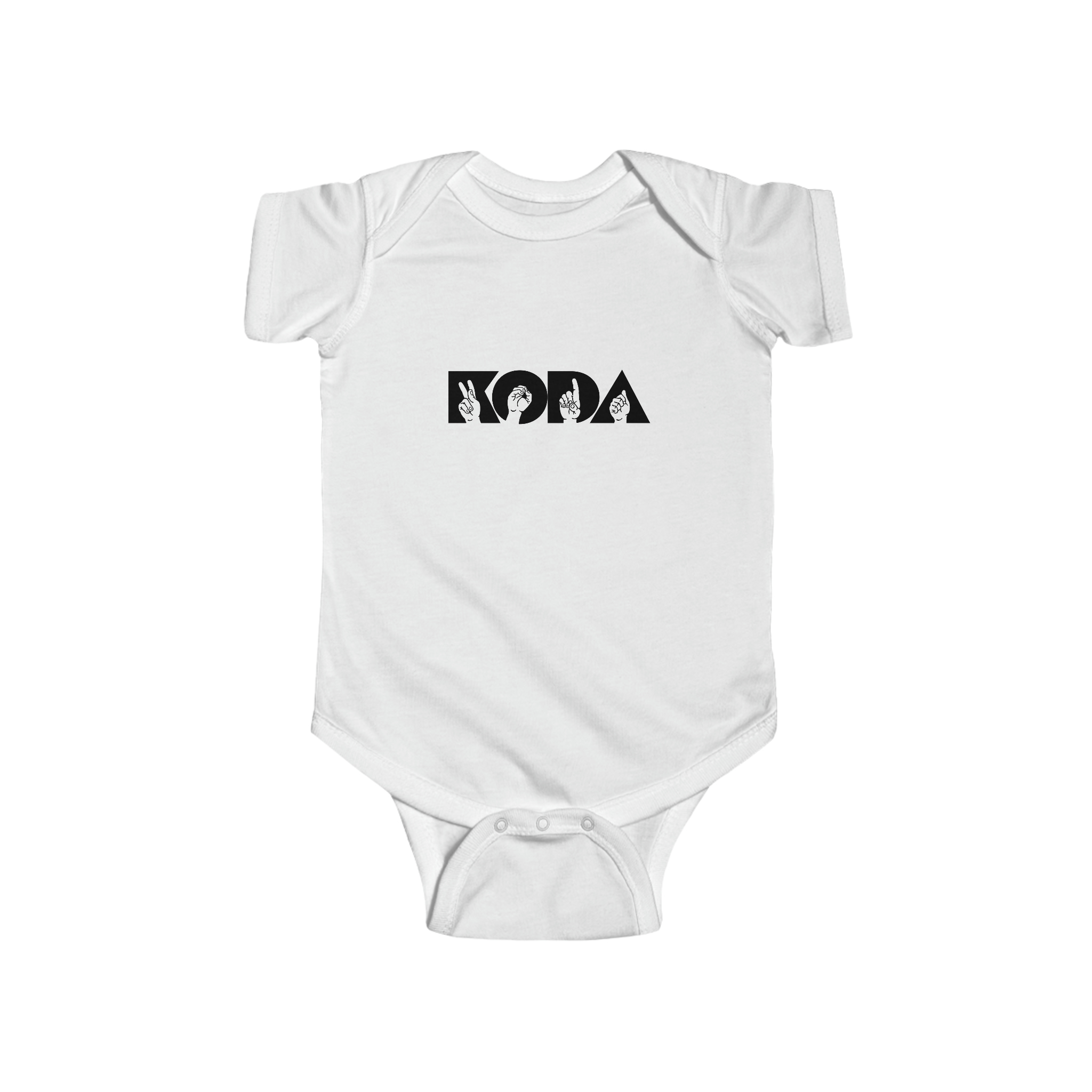 White child's onesie, black lettering. "KODA" in large font with fingerspelled letters inside the English letters.